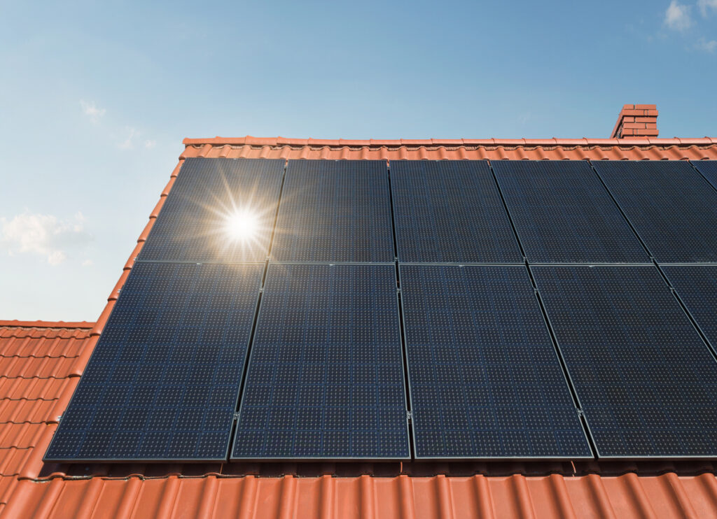 Solar energy panels at the rooftop on a sunny day with copy space