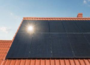Solar energy panels at the rooftop on a sunny day with copy space